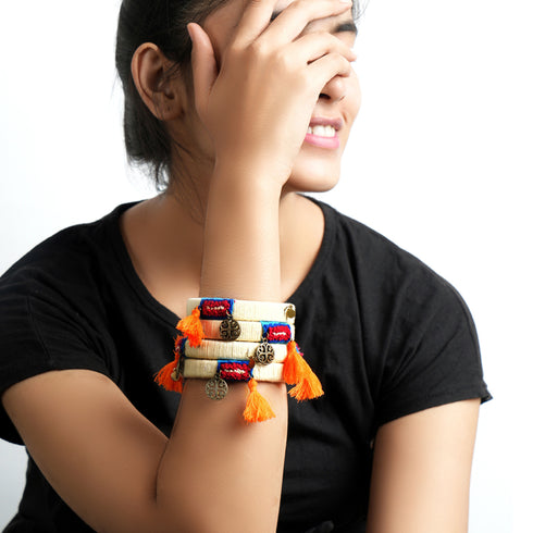 Off White French Knot Bangles with Orange Tassels