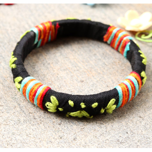 Black Bangle Green Flowers and Multicolored Strap